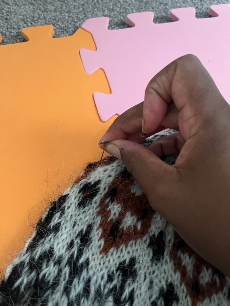 Pinning sweater into place