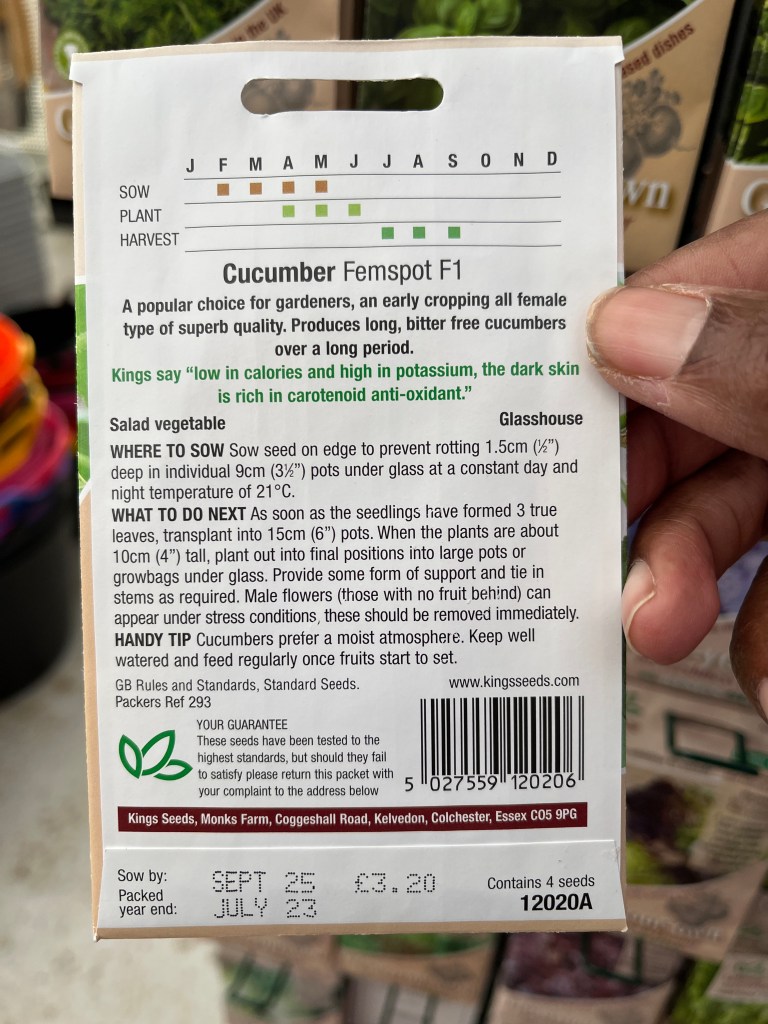 A side by side comparison of the front and back view of a packet of "Grow your own" F1 cucumbers.